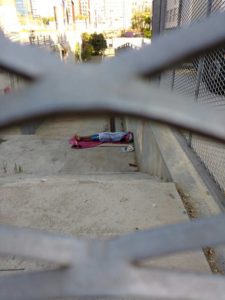 homeless in Barcelona: man sleeping on street